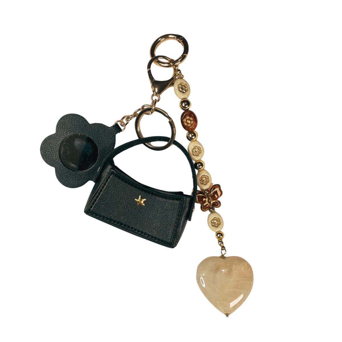 Black keychain with decorative elements on a white background