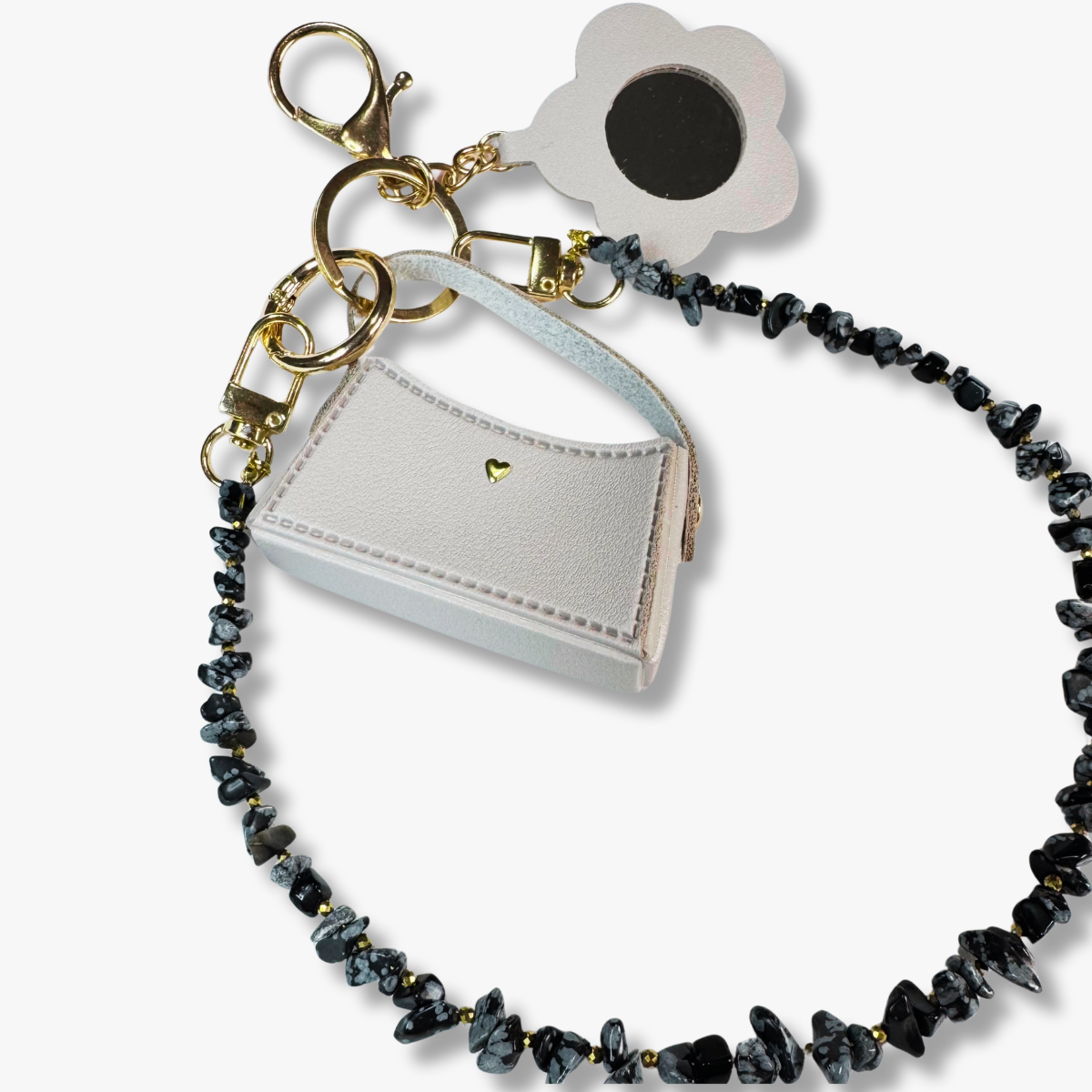 Bag charm with a small pouch charm on a white background
